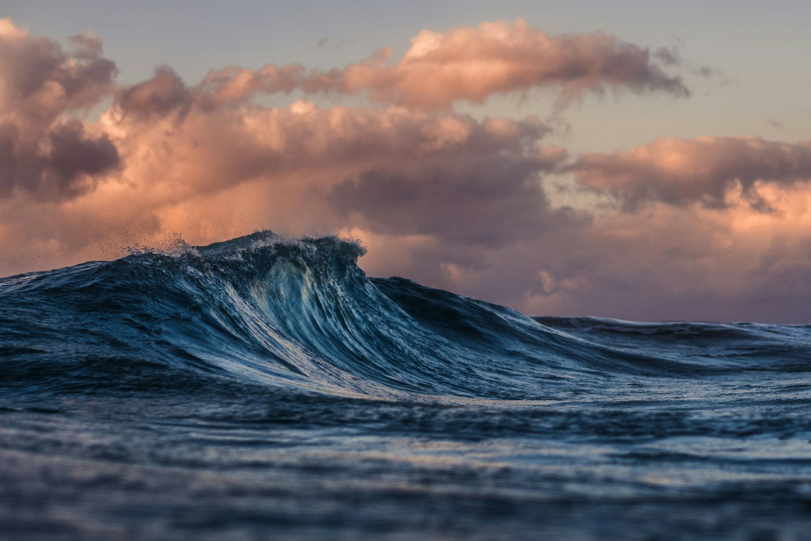 Warm light on open water, the kind of evening families share across the Caribbean